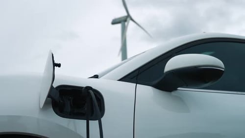 Progressive Combination of EV Car Charging Station and Wind Turbine