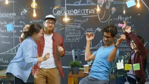 Happy Young People Dancing in the Office. Creative People Have Fun.