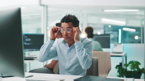 Businessman, software developer and design with computer for app development or coding at office