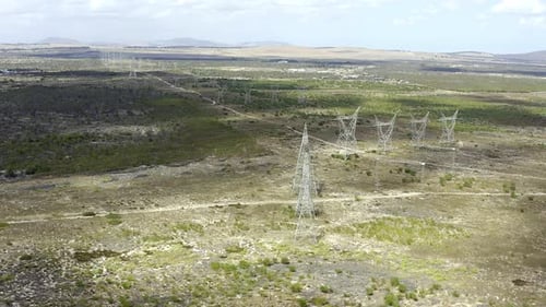 4k drone footage of pylon out on an open field