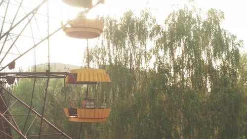 Flying at abandoned Pripyat ghost town in Chernobyl exclusion zone. The decayed Ferris wheel visible