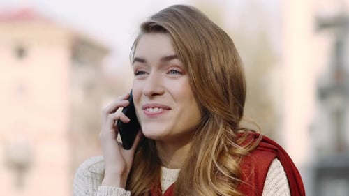 Portrait of Excited Woman Talking Mobile Phone on City Street. Closeup Happy