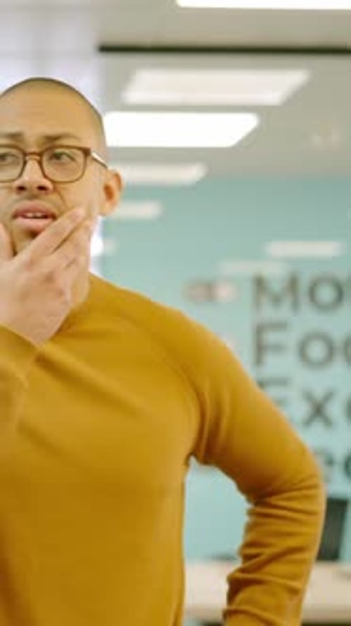 Man Collects His Belongings From an Office After Being Fired