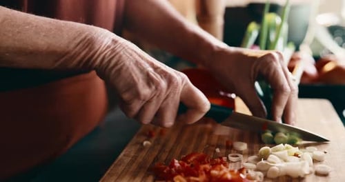 Hands, vegetables and woman in kitchen at house for nutrition, health and cooking meal for diet