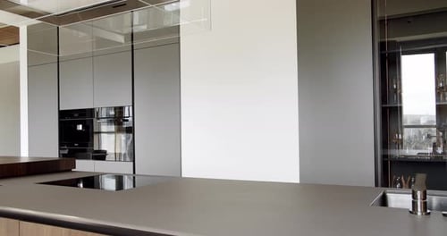Minimalist Kitchen Room in White Colors with Dining Area of Natural Wood