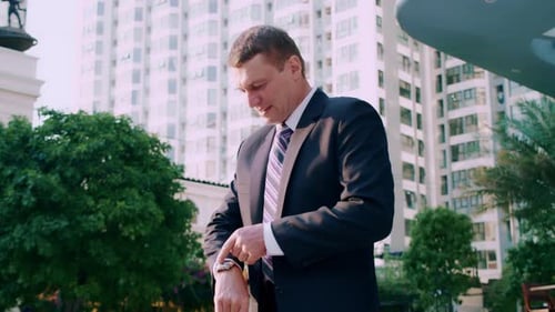 Rear Back View Feet of Businessman Commuting to Work