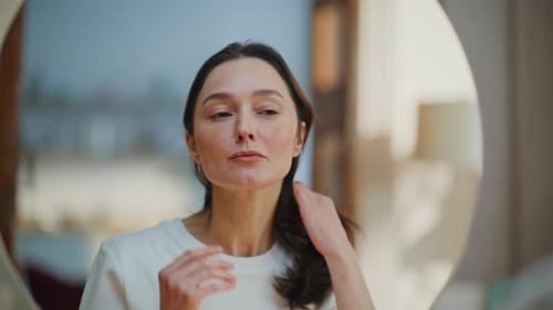 Woman Examining Face Mirror Searching Aging Signs Closeup Lady Studying Skin