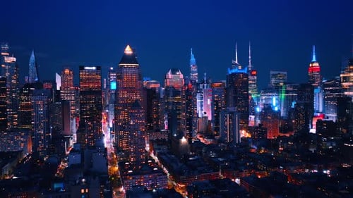 Neon lights on the streets and buildings of the architecture of New York, USA.