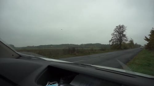 the tractor and plow preparing for the ploughing the field after corn