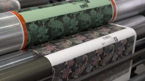 Printing Press Applies Floral and Green Patterns to Material