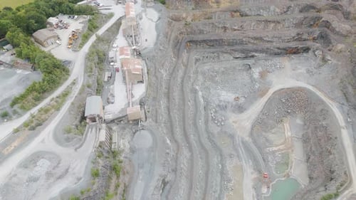 Aerial view of Aggregate Industries quarry mining operation with visible equipment and rock extracti