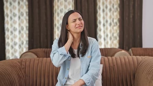 Indian woman having neck pain
