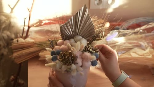 Elegant Flower Arrangement Being Arranged