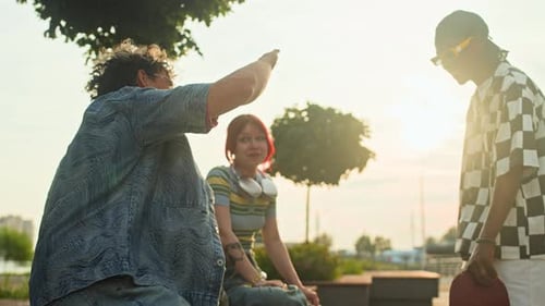 Gen Z Man Giving High Five to Peers on City Boulevard at Sunset