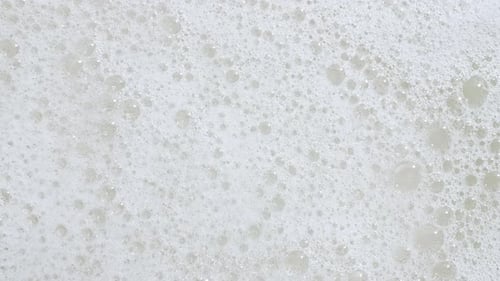 Bubbles of Thick White Creamy Foam