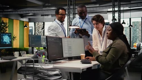 Team of Admins Brainstorm in AI Startup Office to Train Predictive Models