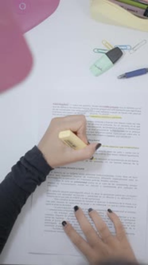 Top Down View of a Table Top A Young Student's Study Materials on the Table and the Girl is