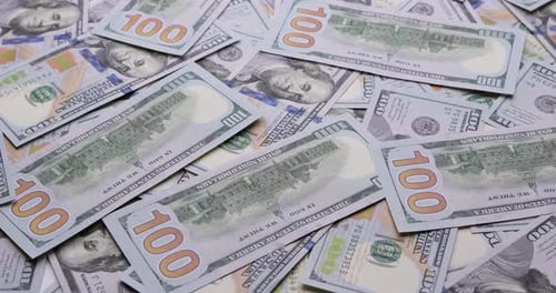 Cash USD Money Background One Hundred Dollar Banknotes Rotate in Close Up Macro View