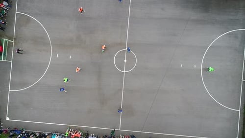Top View Drone Flying Above Amateur Soccer Game Match