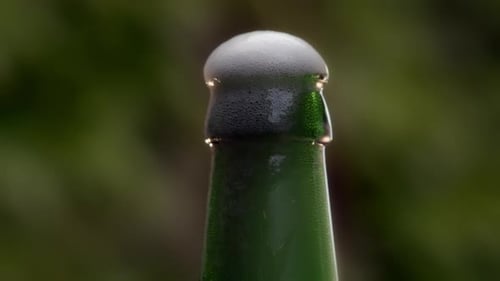 Close Up of Bottle with Foam
