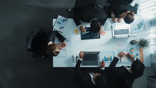 Top view of business people brainstorm financial plan at meeting. Directorate.