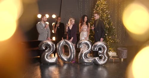 Diverse Friends Celebrating New Year's with Balloons