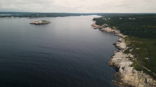Aerial View of the Atlantic Ocean and Rocky Coastline in Nova Scotia Canada