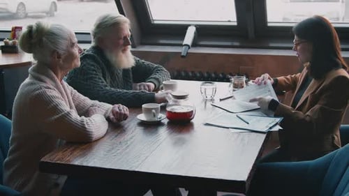 Seniors Consult With Businesswoman Over Tea