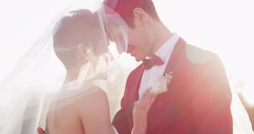 Bride and Groom Embrace During Wedding Ceremony