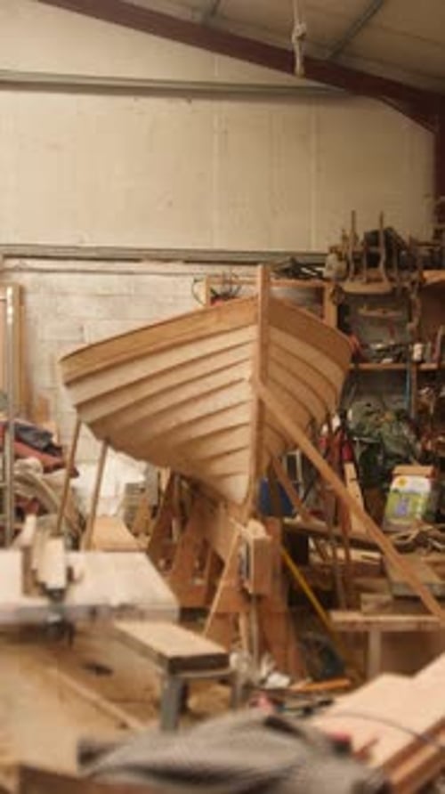 Wooden Boat Under Construction in Workshop, Hull and Planks