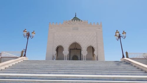 Mausoleum of Mohammed V, Hassan Tower, Rabat, Morocco with blue sky backdrop
