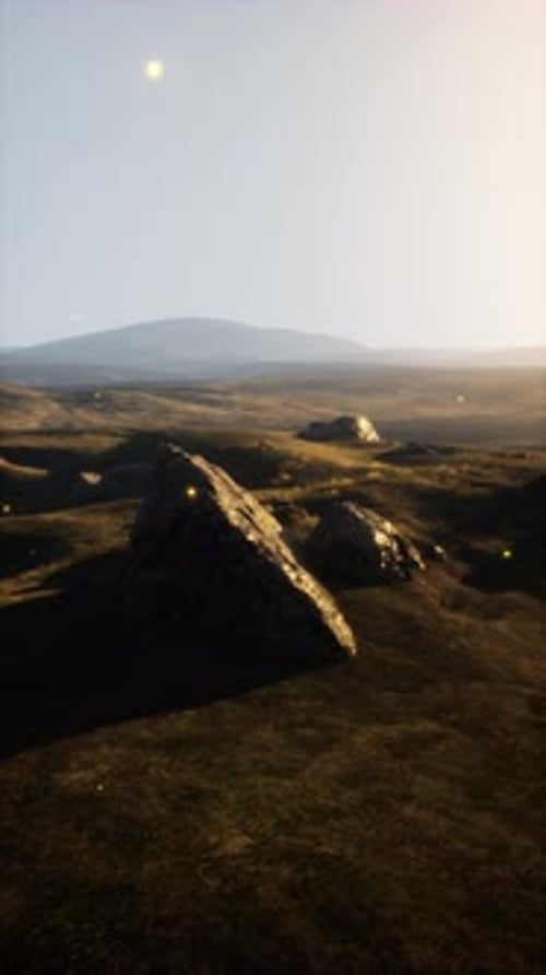 Grassy Plain With Rocks and Grass