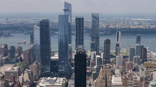 Slow motion landscape of commercial towers buildings infrastructure skyscrapers high rise New York c