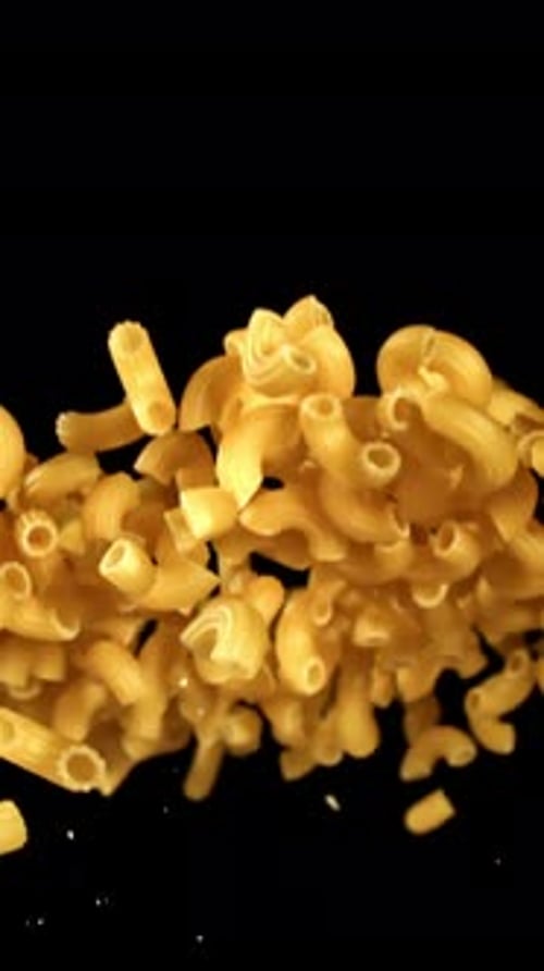 Super Slow Motion Flying Dry Macaroni Pasta Filmed on a Highspeed Camera at 1000 Fps