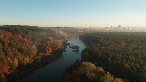 A Tranquil Aerial View of Vilnius Neris River Surrounded By Vivid Autumn Foliage