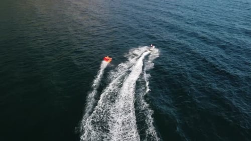 Thrilling Watersports Adventure: Jet Ski Pulling Tube
