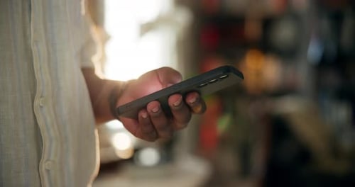 Hand, phone and texting in home with connection for mobile app, chat and scroll for post on web