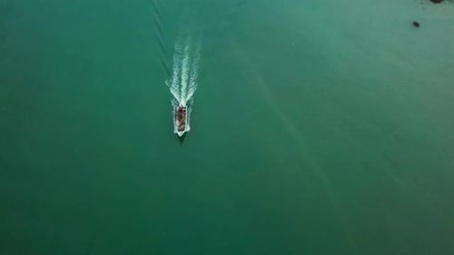 A small fishing boat sailing on the sea, Pangkor Island