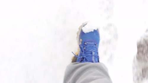 Walking in Fresh Snow Creates Footprints