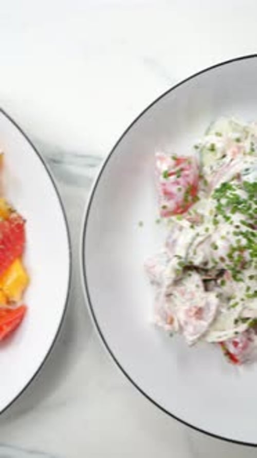 Collection of Plates of Salad Viewed from Above