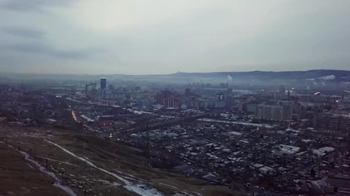 An Urban Landscape Showcased Beneath a Dramatic and Cloudy Sky Full of Intriguing Features Stock