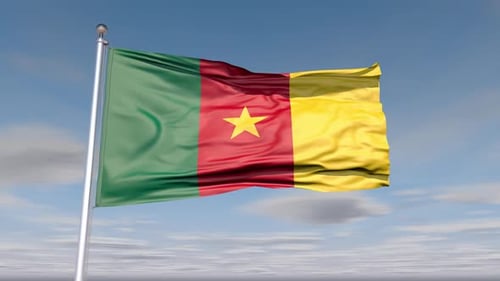 Cameroon National Flag Waving Realistically in Blue Sky
