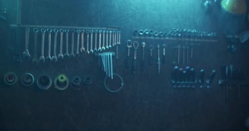 Tools Hanging on Board in Workshop