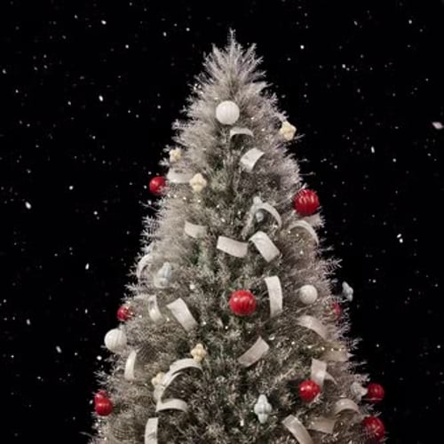 Elegant Christmas Tree with Falling Snow and Ornaments