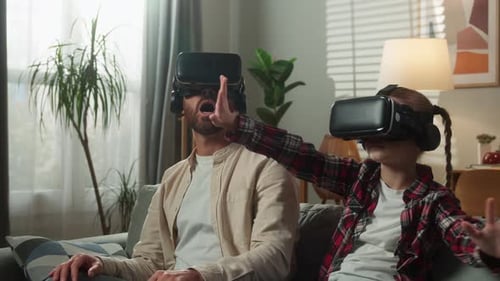 Caucasian Family Using VR Technology Father with Daughter Wearing Virtual Reality Helmets Enjoying