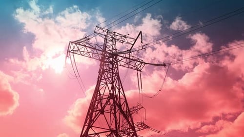 Time Lapse Tower and High Voltage Power Line at Sunset