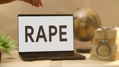 RAPE DISPLAYED IN LEGAL LAPTOP SCREEN