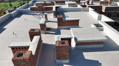 The Roof of a Multistorey Building with Ventilation Channels and Communications
