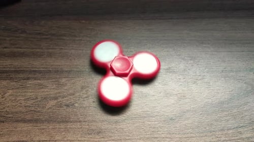 Red and White Fidget Spinner Spinning