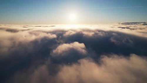 Aerial View of Clouds at Sunrise or Sunset